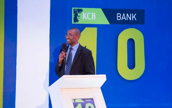 Joram Kiarie (R), the KCB Bank Uganda Managing Director with Dr. Louis Kasekende (C)the Deputy Governor and Bank of Uganda during the bank’s 10-year celebration in Uganda.