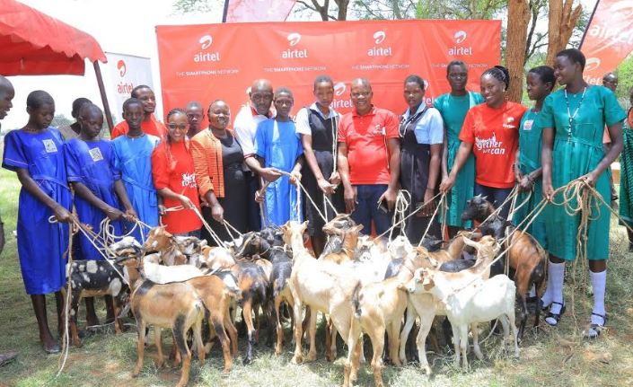 The Airtel Uganda team hands over 50 goats to school going girls in Moroto district. 