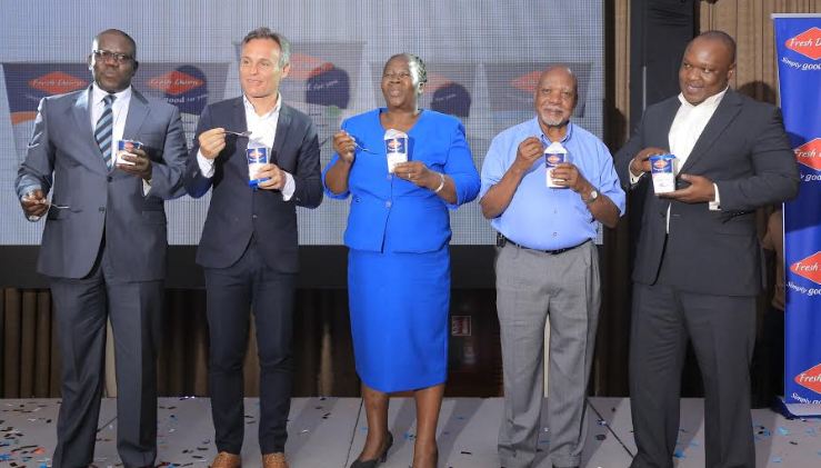 L-R: Joseph Awino – Sales Manager Fresh Dairy, Oliver Mary – Marketing Director Fresh Dairy,  Dr. Ademun Rose – Assistant Commissioner Animal Health, Ministry of Agriculture, Animal Industry and Fisheries,  Robert Walibwa – Advisor Milk Procurement and Extension Fresh Dairy and  Vincent Omoth –Marketing Manager Fresh Dairy launching the newly re-branded Fresh Dairy yoghurt.