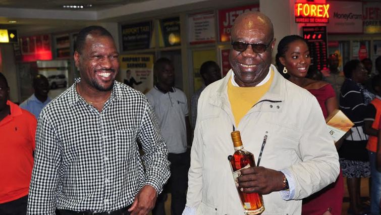 Isaiah Katumwa welcomes Jazz Legend Manu Dibango at the airport