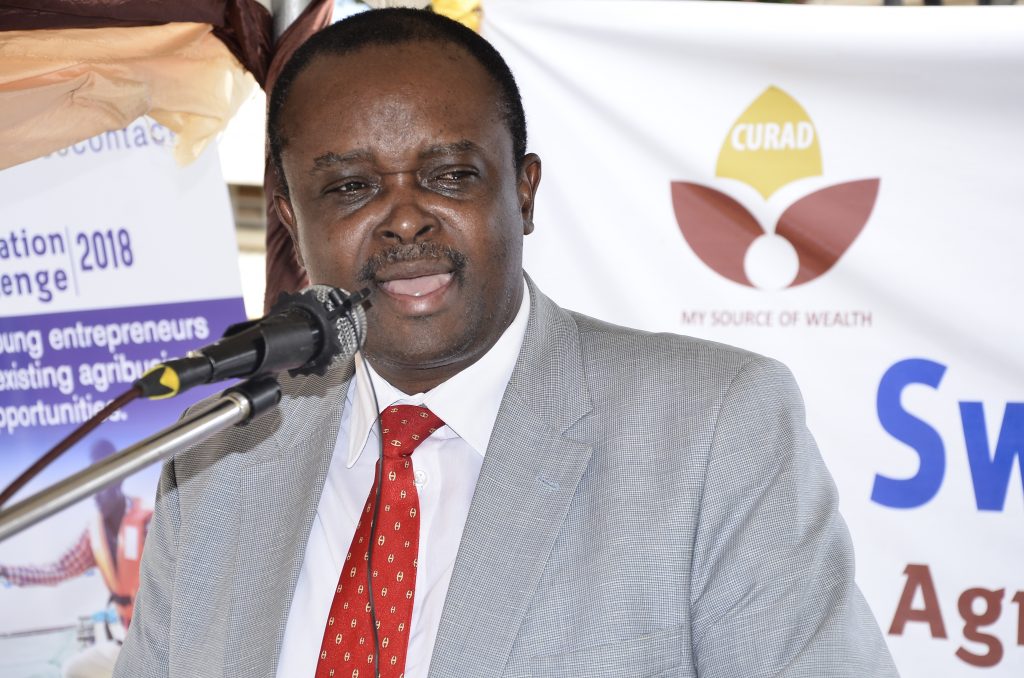 Stanbic Bank Head of Agriculture lending Richard Wangwe making his remarks during the event held at the Makerere University Institute of Research in Gayaza, Kampala.