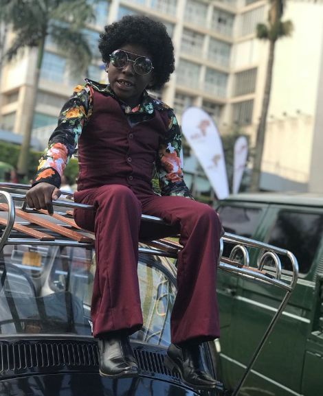 8-year-old Gary Gavina Ahabwe emerged as the best dressed male at CBA Uganda Vintage & Classic Auto show