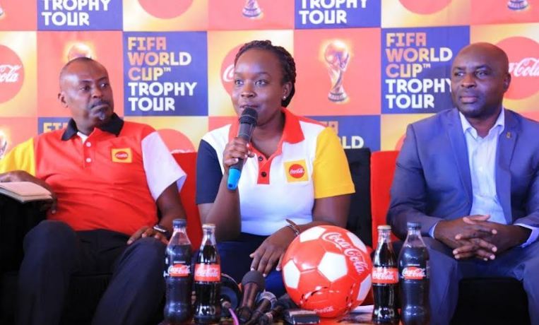 Coca-Cola Uganda Brand Manager Ms. Miriam Limo addresses guests during the press conference.