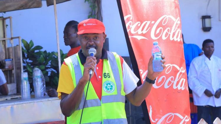 Coca-Cola Beverages Africa Public Affairs & Communications Director Simon Kaheru addressing media.